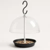 Clear dome hanging platform bird feeder with black round seed tray and S-hook