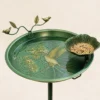 Embossed metal bird bath basin with separate leaf-shaped seed feeder