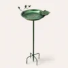 Antique green ground-stake bird bath with leaf-shaped feeder cup