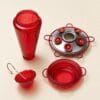 Wide-mouth red glass bottle, six-port metal base and ant moat shown separately for cleaning